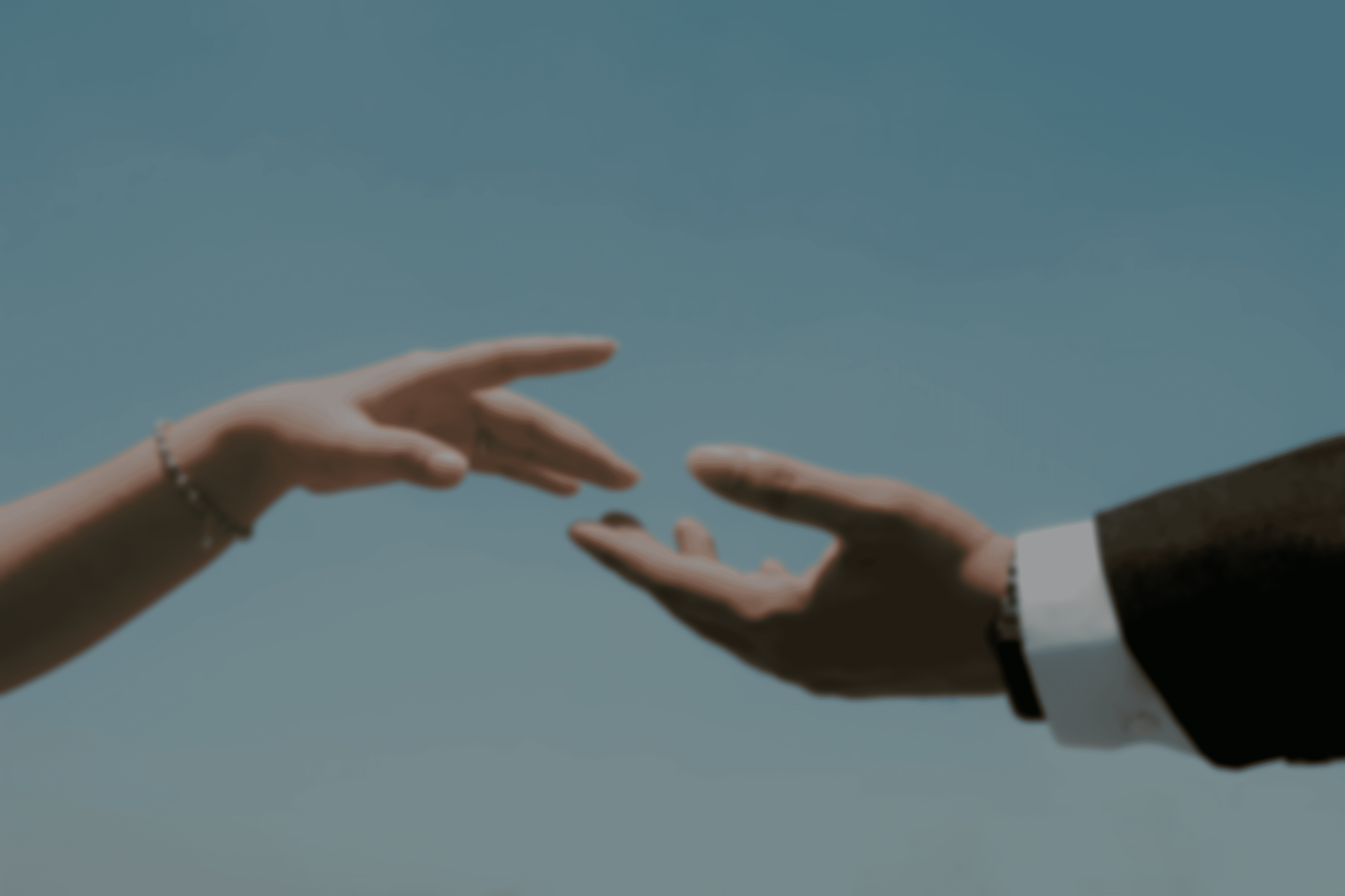 2 hands reaching out