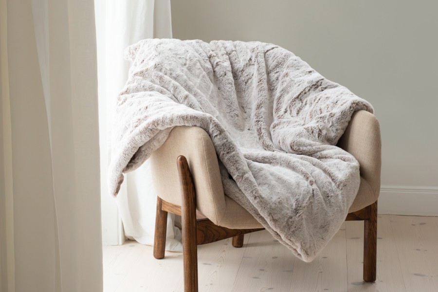 a woman holding a red flower