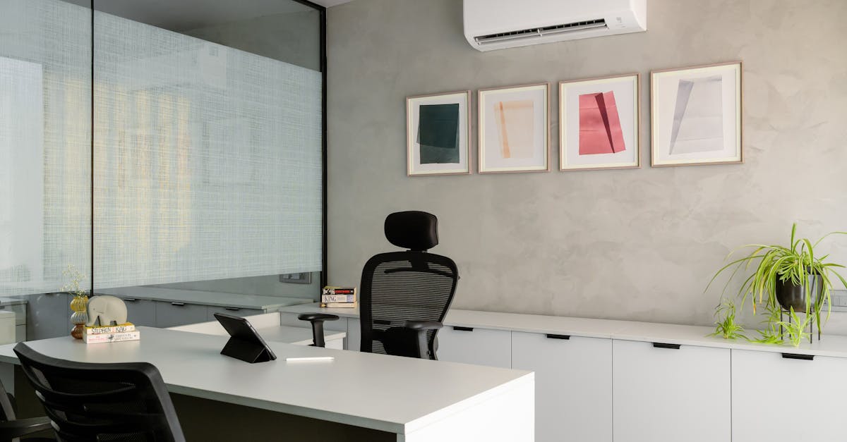 Contemporary office space with a sleek desk and modern decor, perfect for a professional setting.