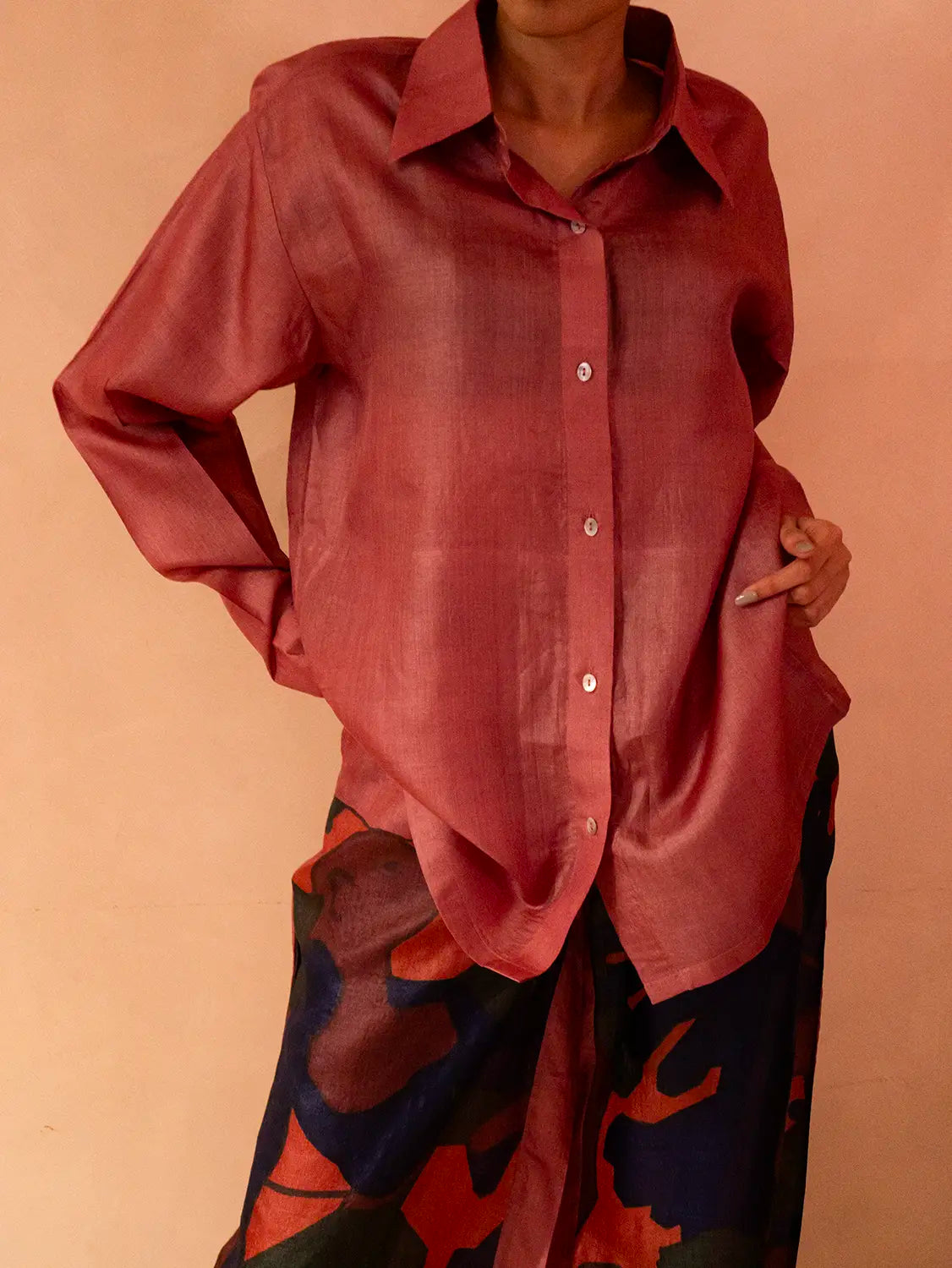 A relaxed co-ord set featuring a simple silk shirt, Designed for effortless wear