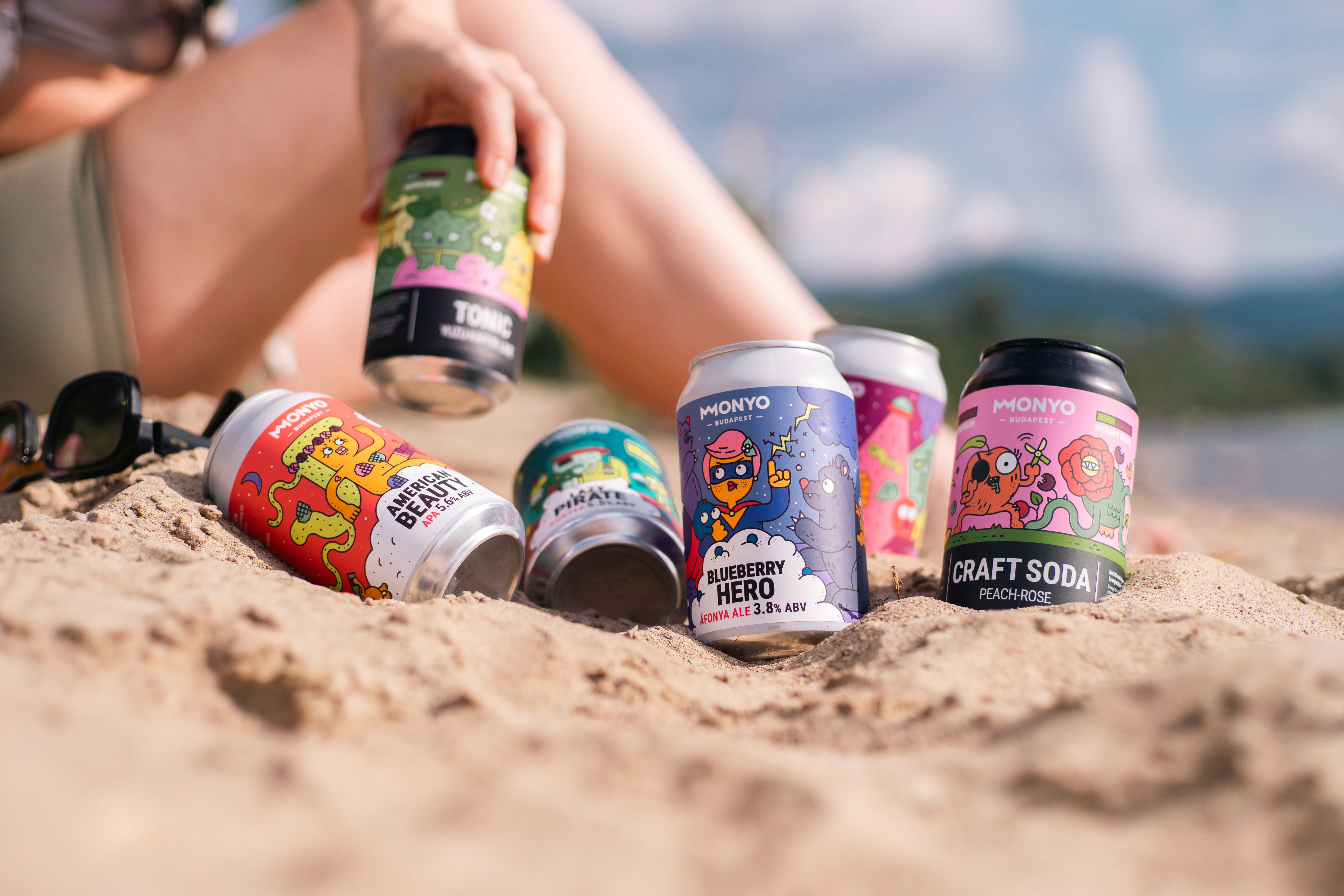 The team working together at a table with laptops, discussing business strategies or projects.