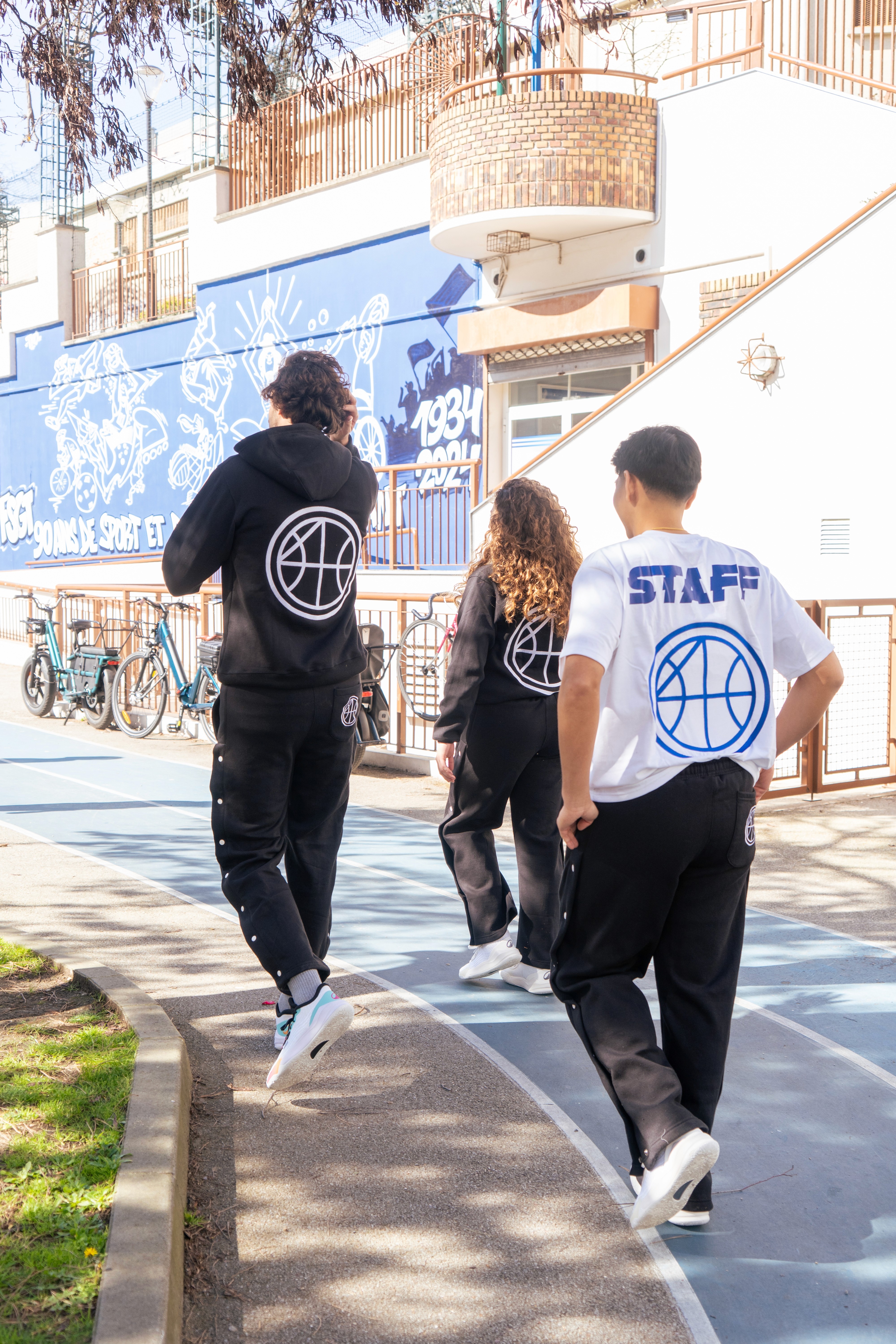 a brown leather chair sitting in front of a window