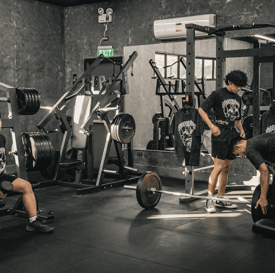 Professional gym setup with squat racks and elite training equipment at Baseline Physical Space.