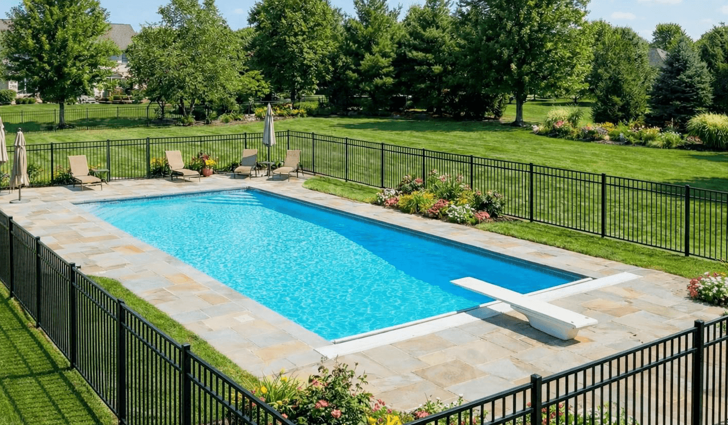Tall 54-inch Haven Plus aluminum fence securing a large commercial community pool deck.