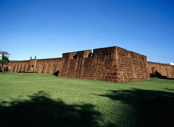 Palakkad Fort, a historic 18th-century fortress in Kerala, India, known for its well-preserved granite walls, lush green surroundings, and rich cultural heritage.