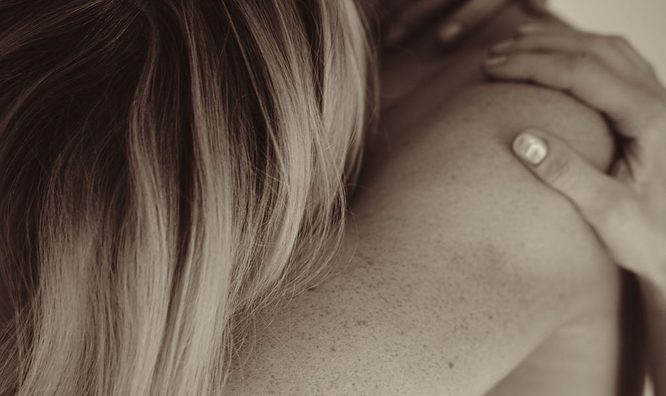 Close embrace with bare skin in soft light, the warmth and closeness of a high sex drive