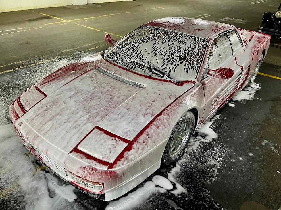 Ferrari getting prepped for paint correction and ceramic coating in kansas city