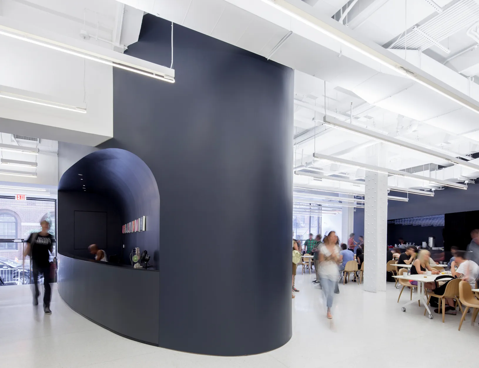 Installation pulley system with volunteers to elevate plastic cup ribbons