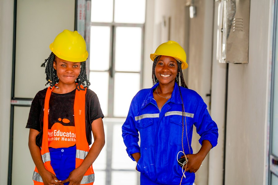 Two skilled workers in hard hats