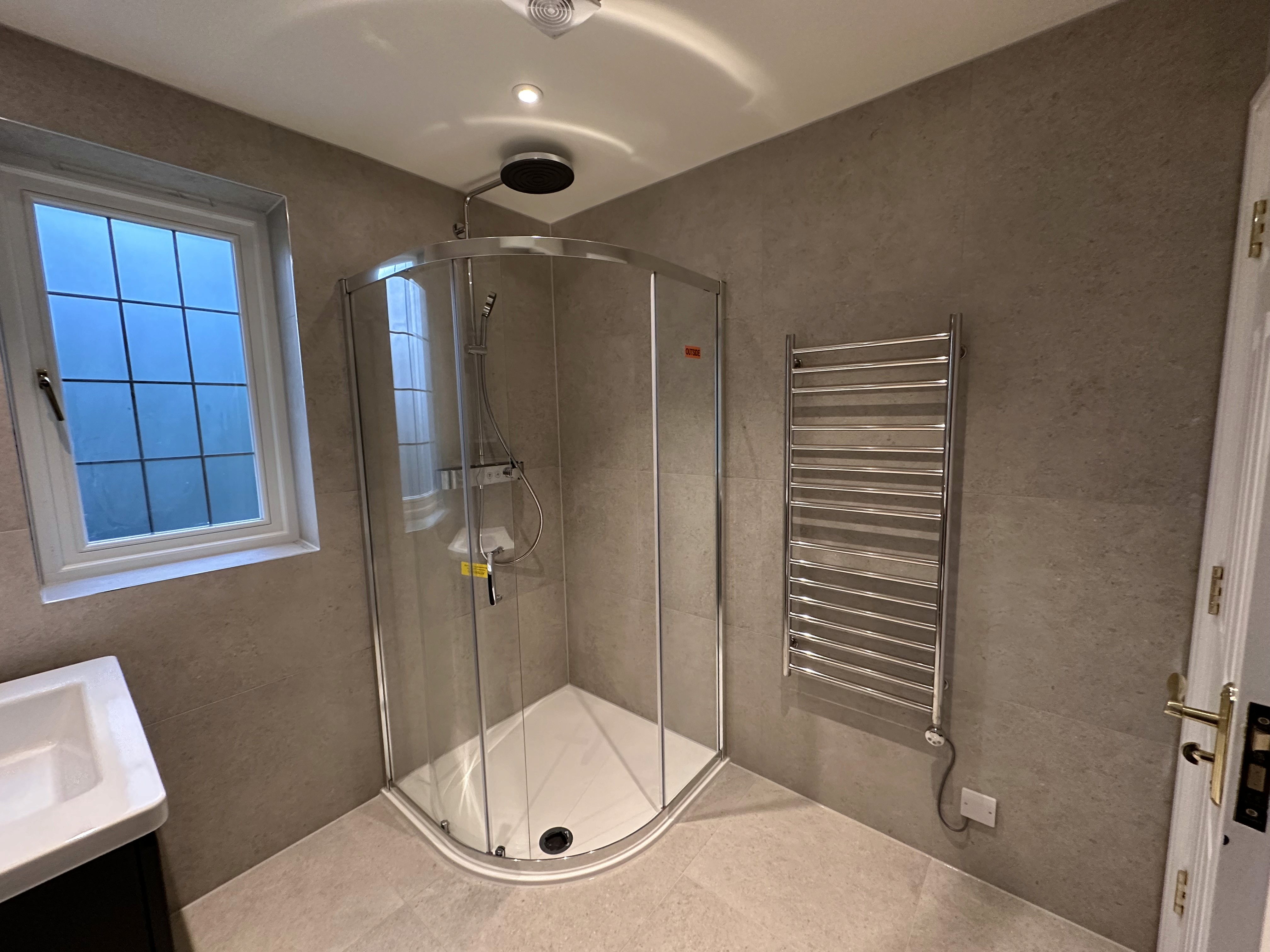 luxury bathroom door opened rear view