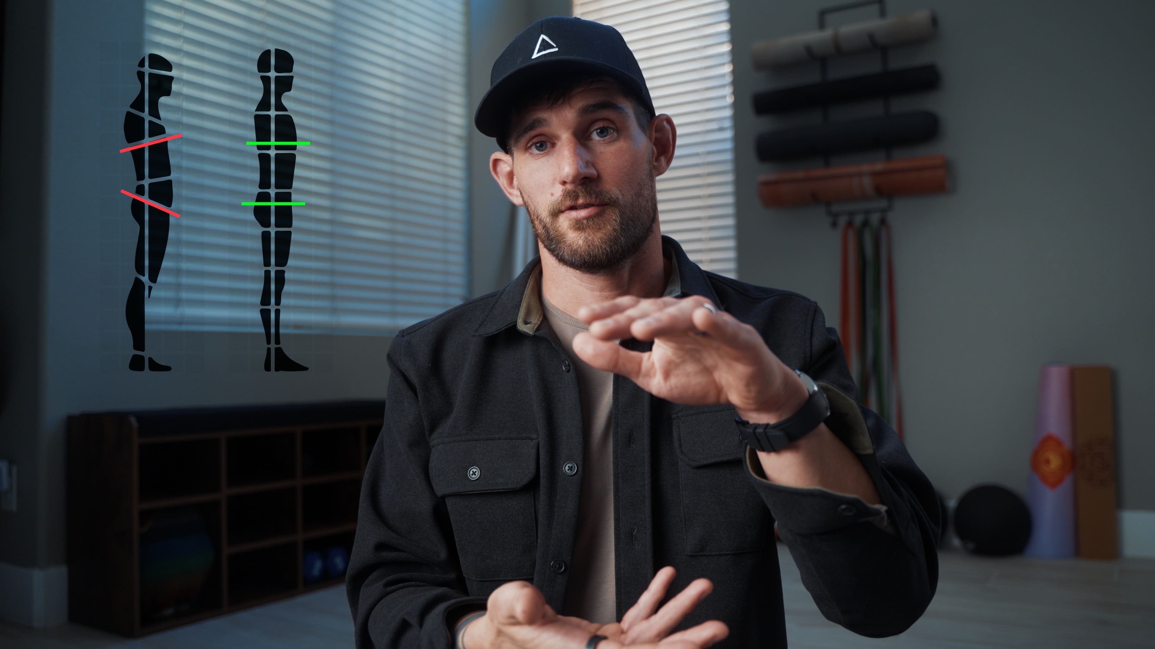 Flo in an office setting with anatomy posters behind.