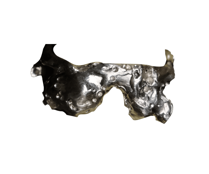 Sculpted silver ring with rough, uneven surface