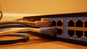 Different cables at the back of a broadband router