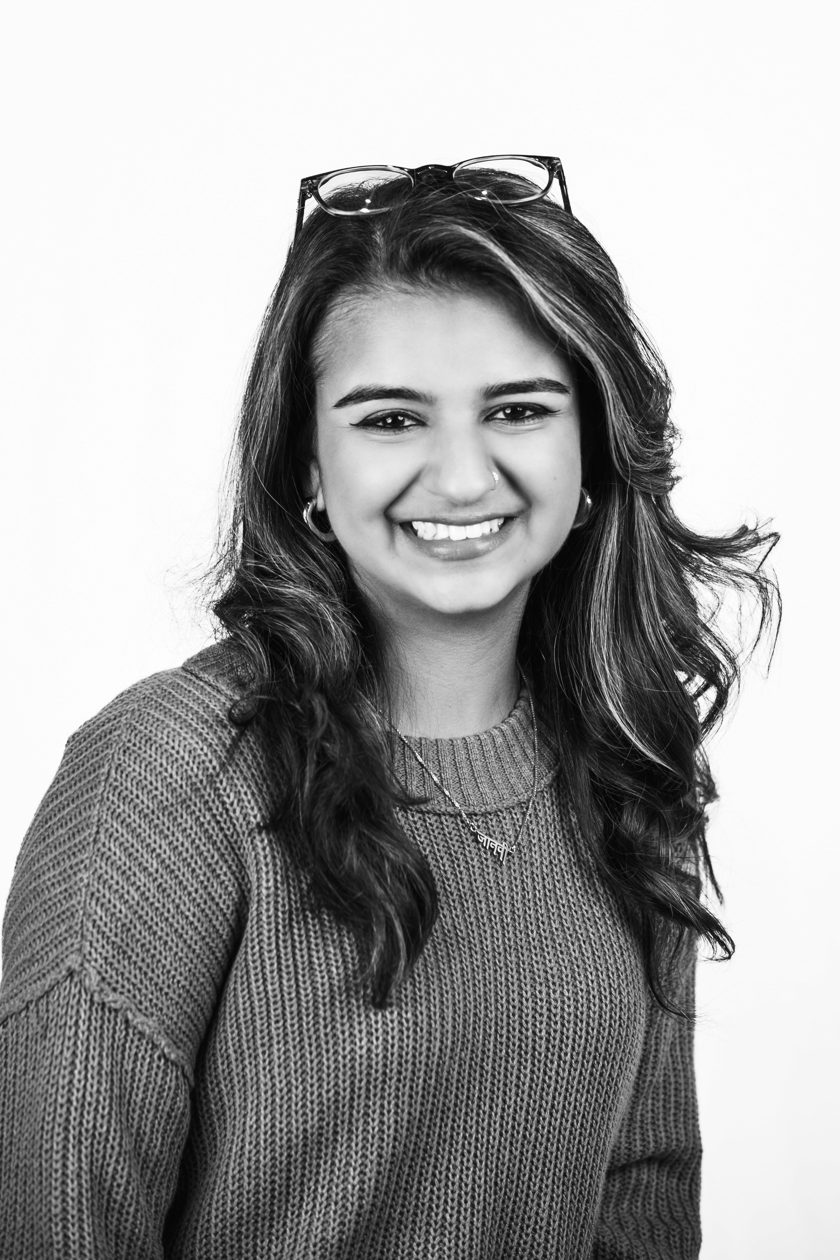 a blurry photo of a person standing in front of a wall