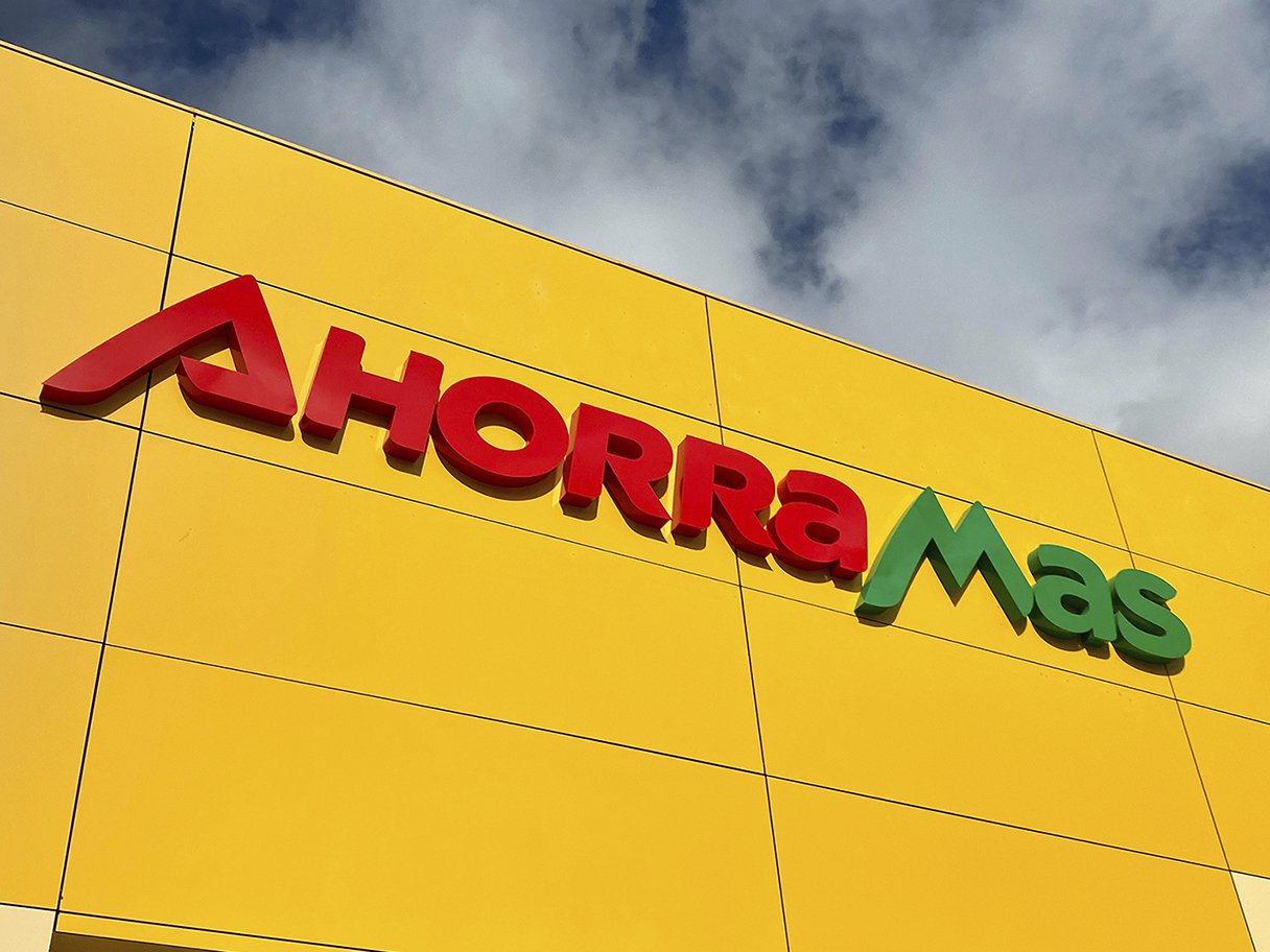 Rooftops of a coastal town with the sea in background