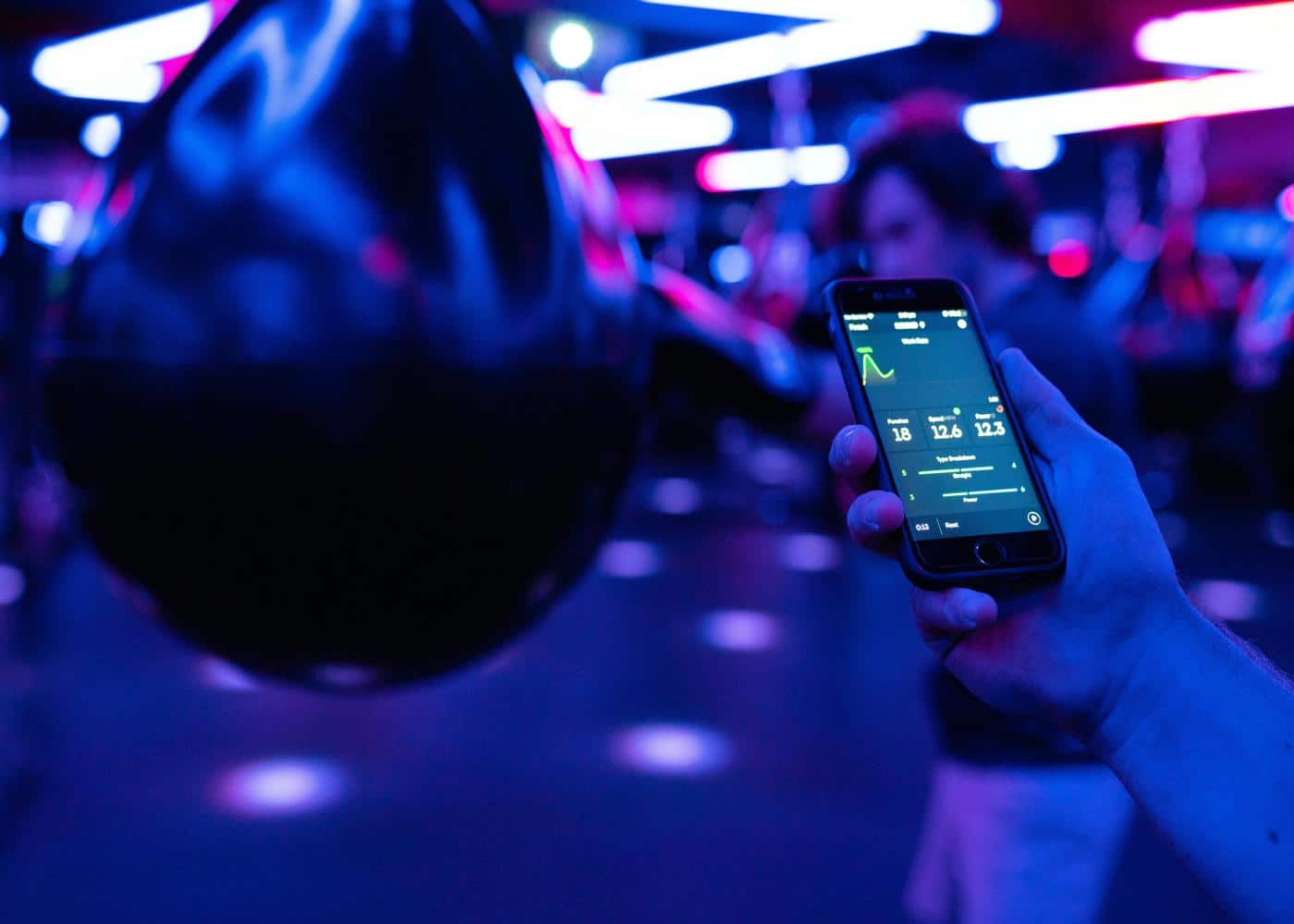 An AI-powered fitness coaching app on a smartphone