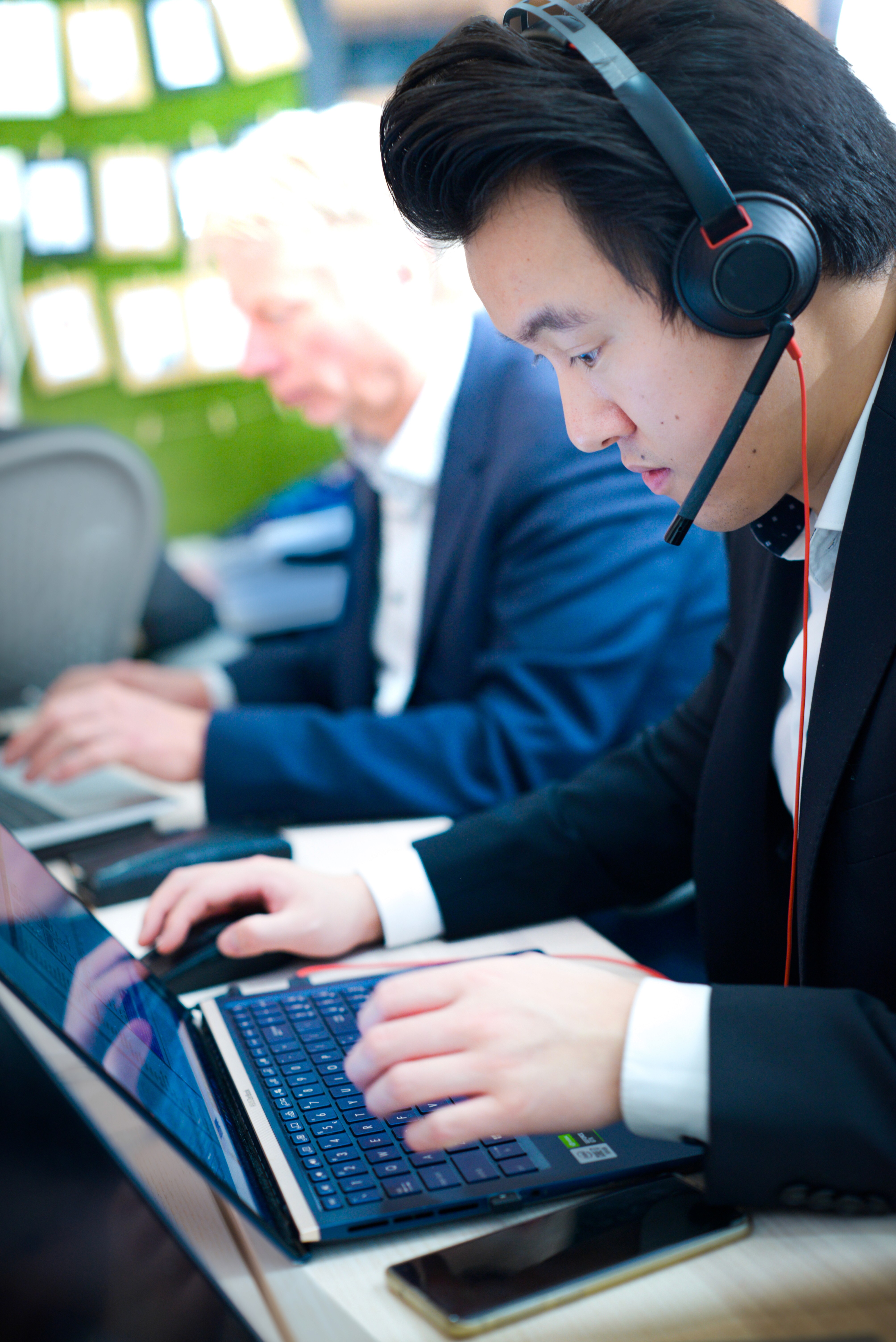 Man behind computer screen