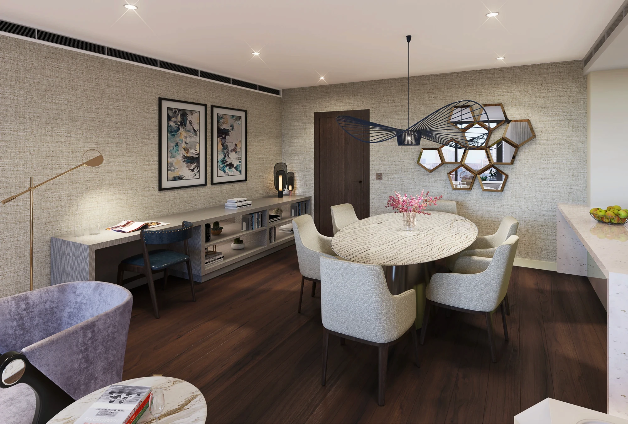 A modern dining room with a round marble table surrounded by eight upholstered chairs, featuring a unique geometric mirror on the textured wall and a decorative vase with pink flowers as the centerpiece.