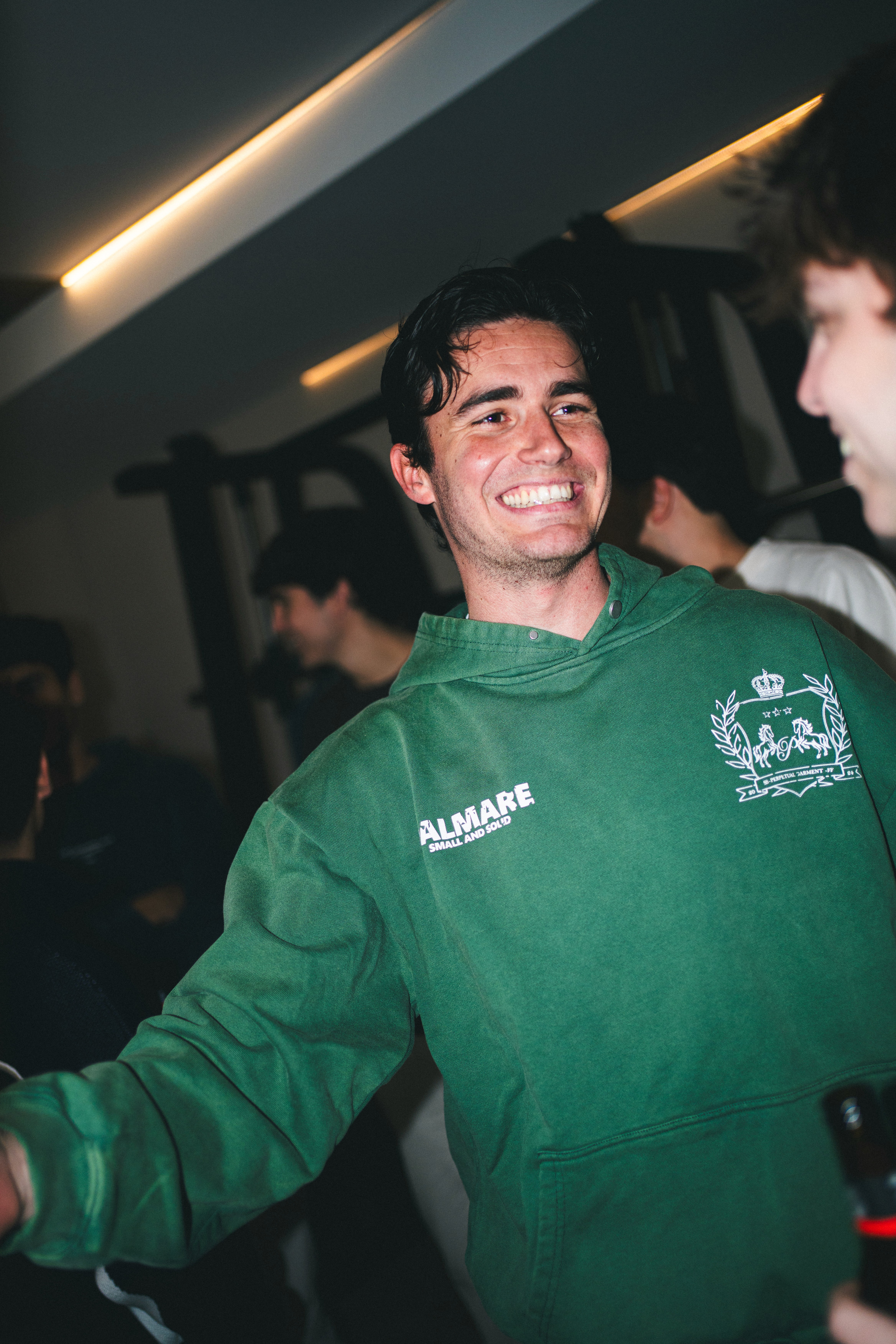  A woman with her eyes closed, wearing a helmet, appears to be in a moment of concentration or relaxation.