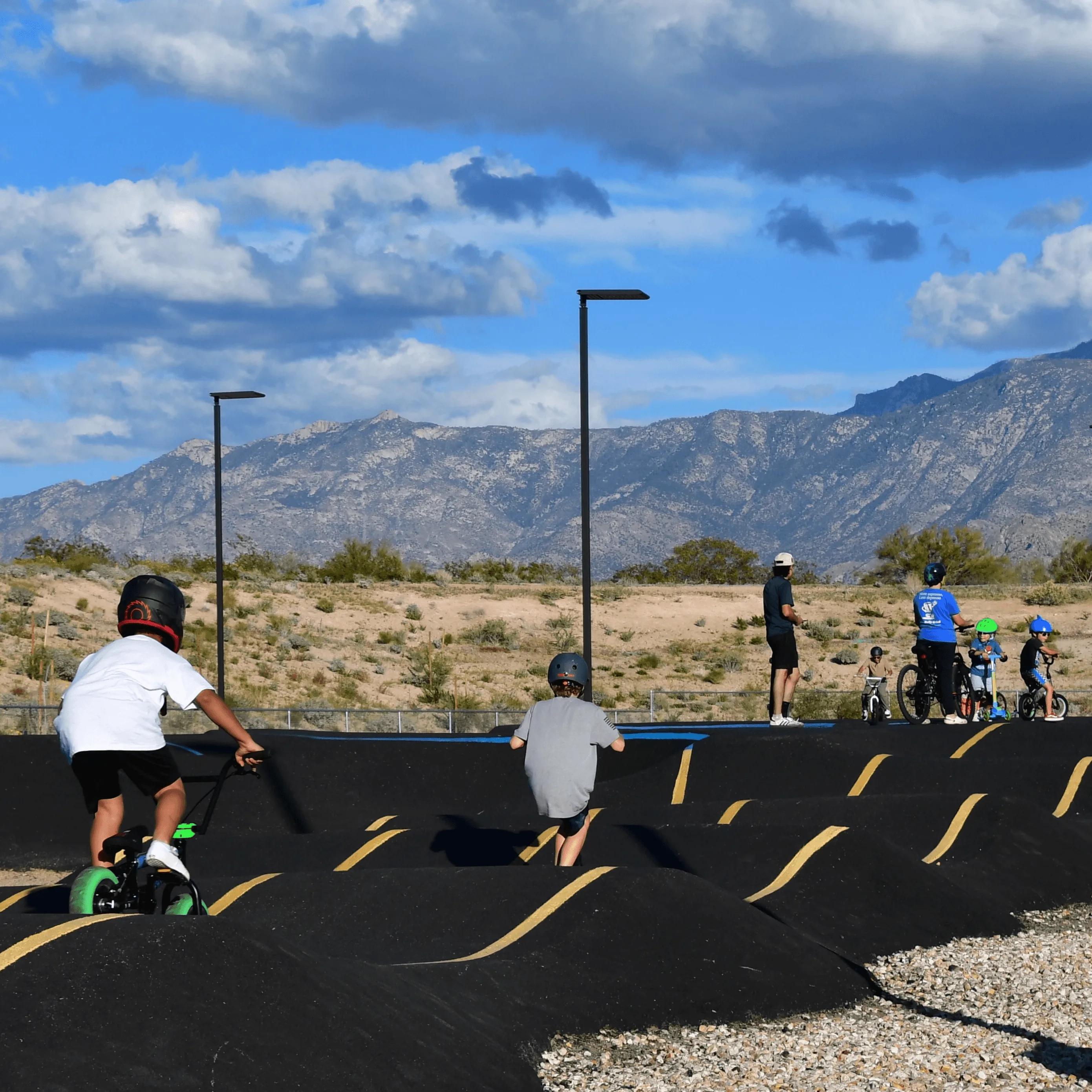 Children playing at the Naranja Park Skate Park and Pump Track.