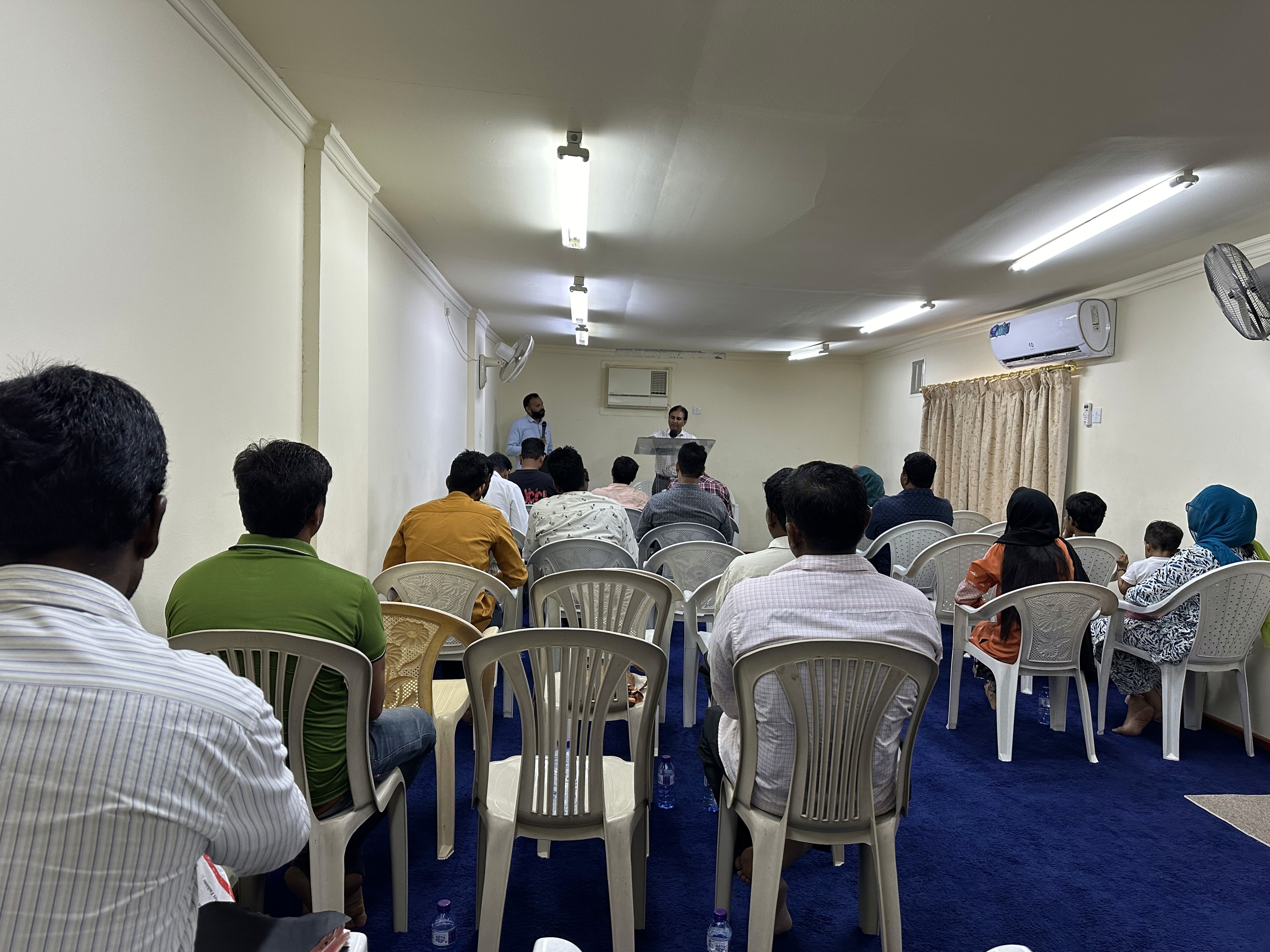 red chairs inside white and gray cathedral