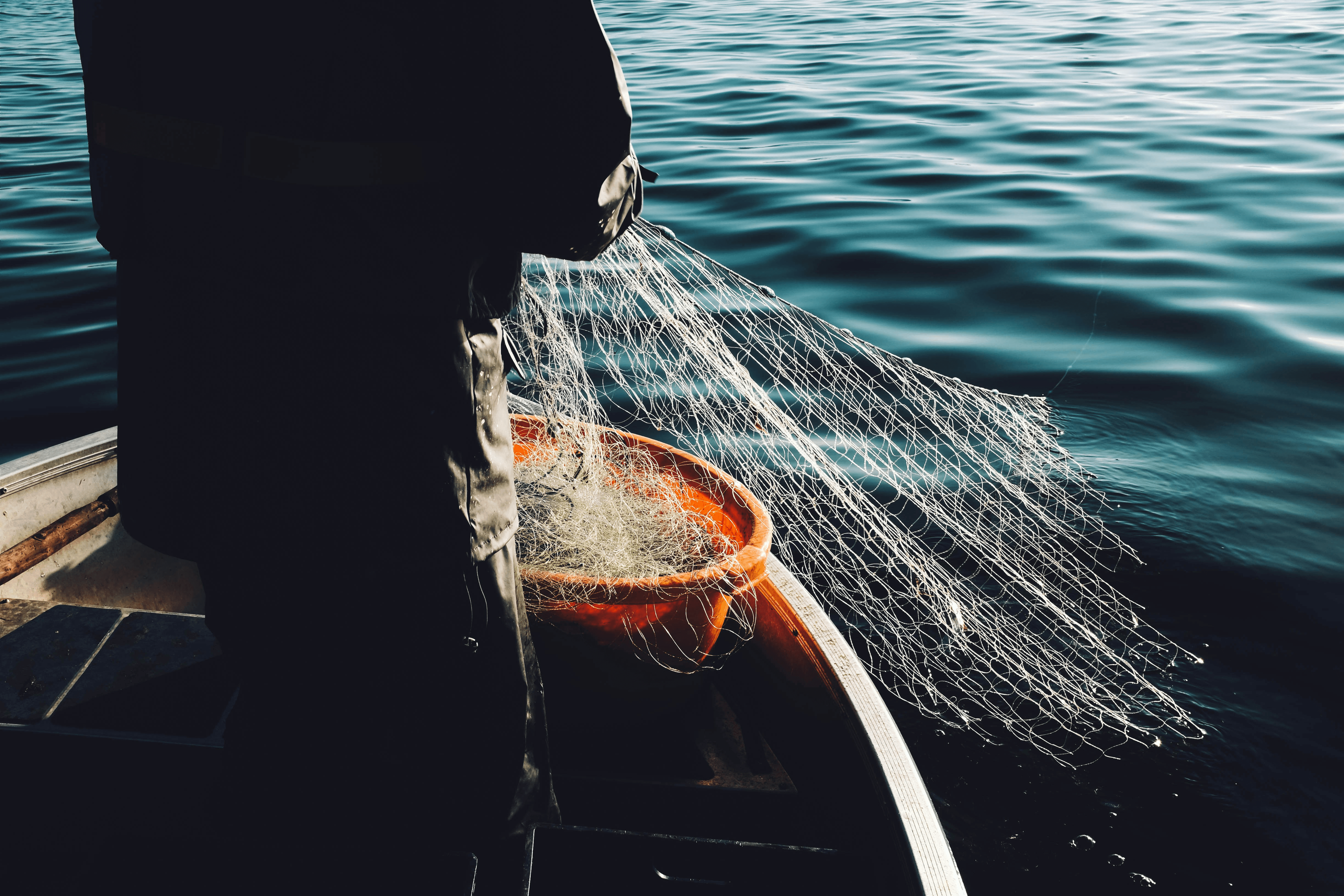 man holding a fishnet