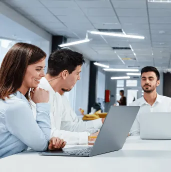 Business professionals collaborating with Oracle NetSuite to manage business accounting and financial operations.