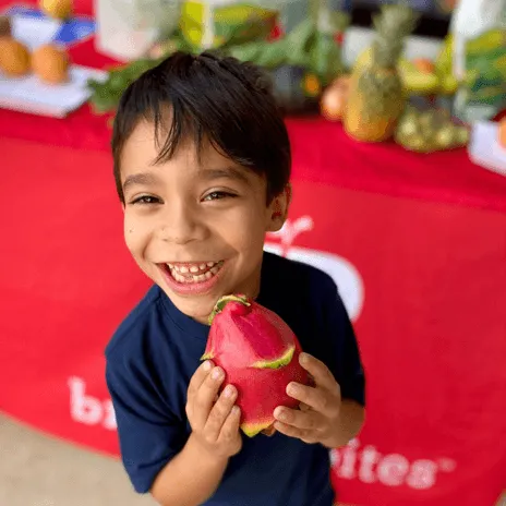 Layered latte in glass with flowers and plants