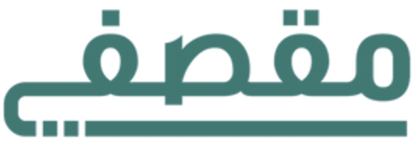 woman smiling and sitting