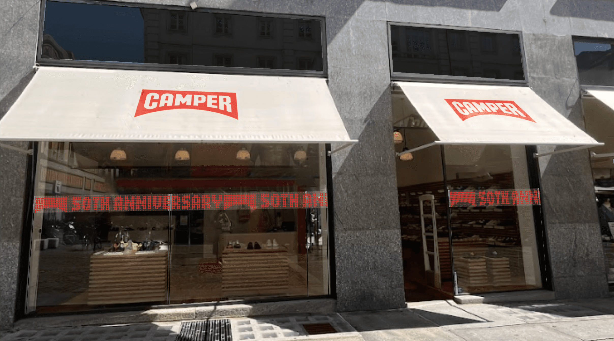 Camper shop with transparent LED screen on which customers can send private message to display in the window.