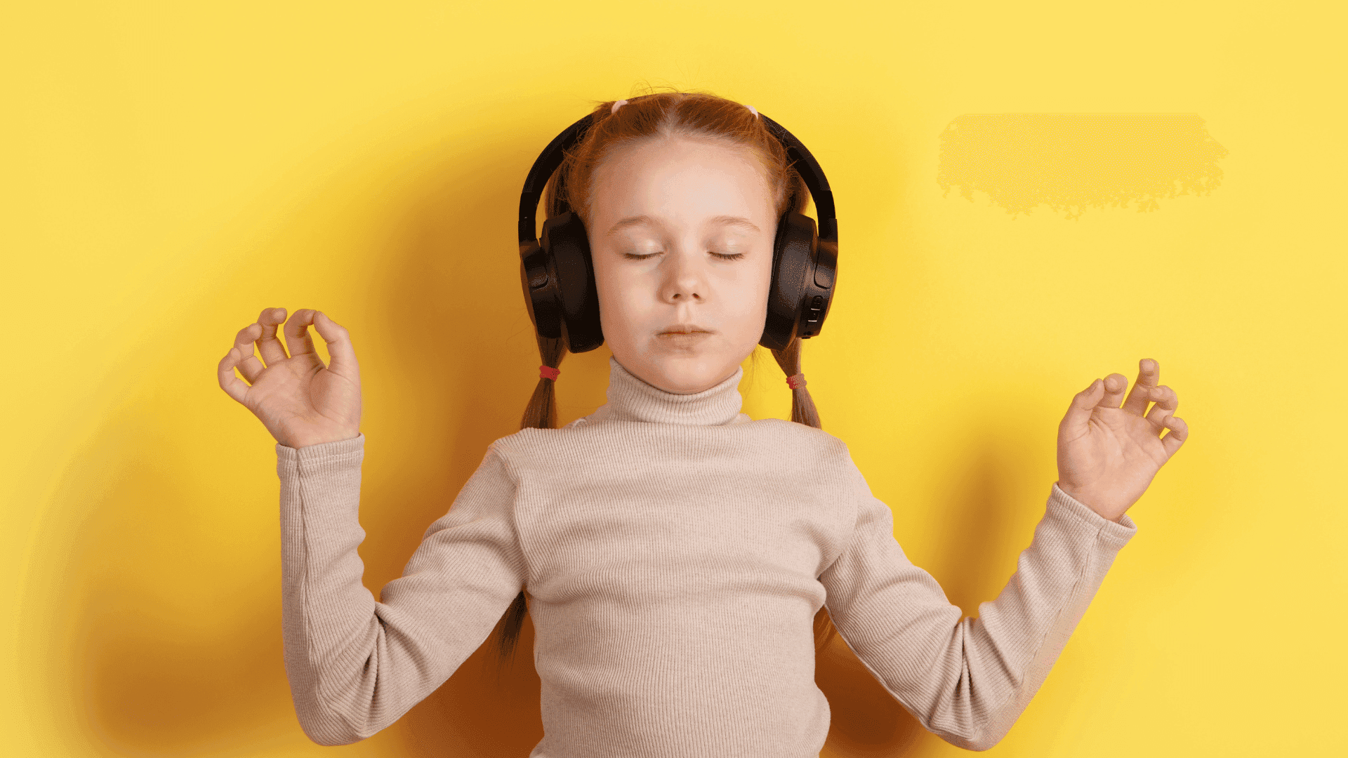 A girl wearing headphones, meditating while listening to HushAway®’s Sound Sanctuary.