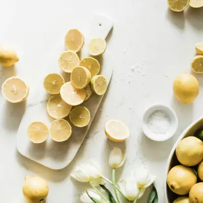 sliced lemon on white ceramic plate