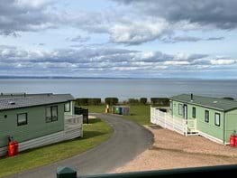 A photo from outside Sidlaws rest on the decking overlooking the St Andrews Bay