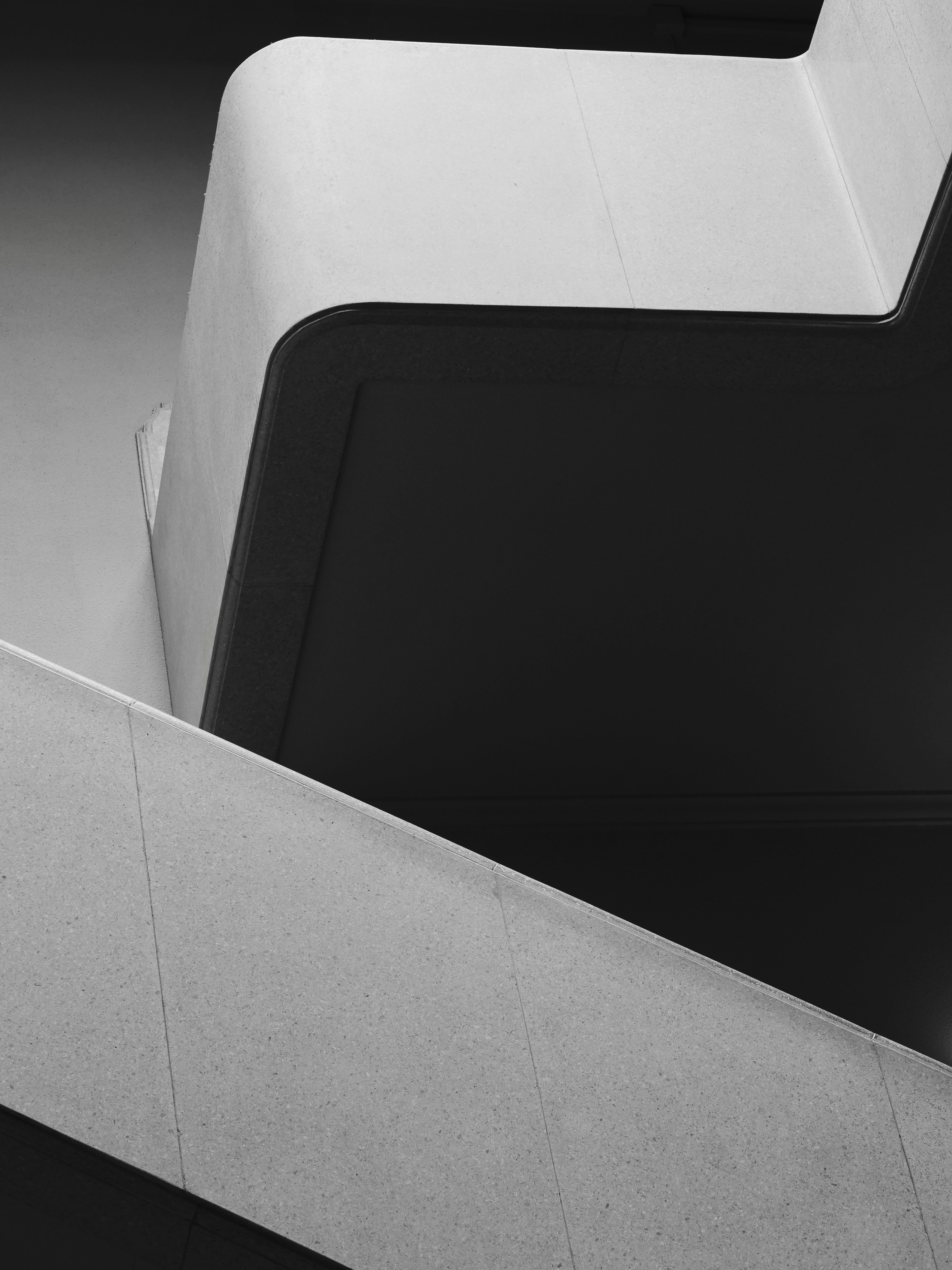 Abstract white geometric shapes on black background