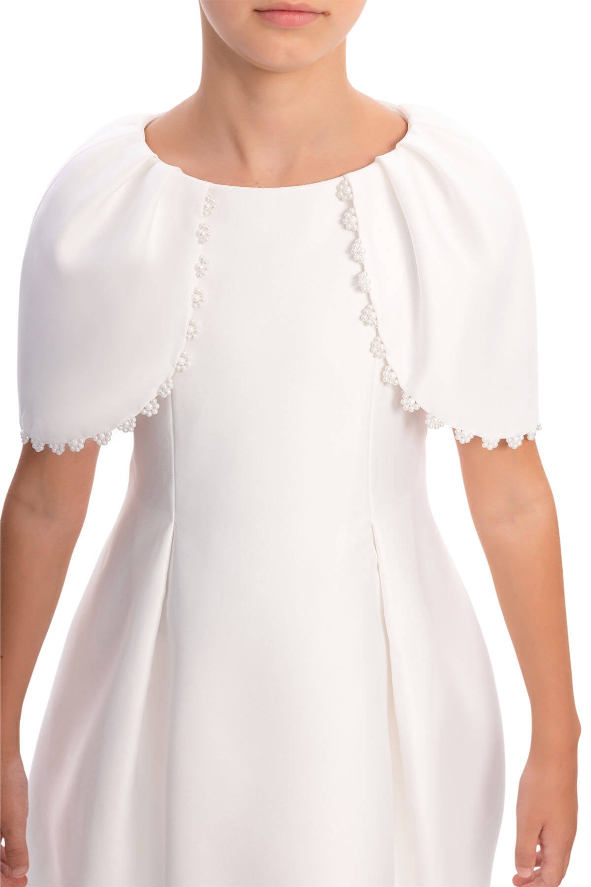 White dress with lace details on a white background