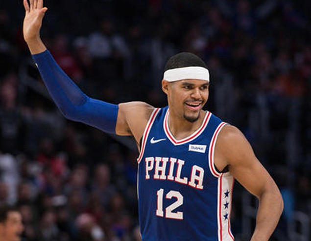 Photographer holding camera