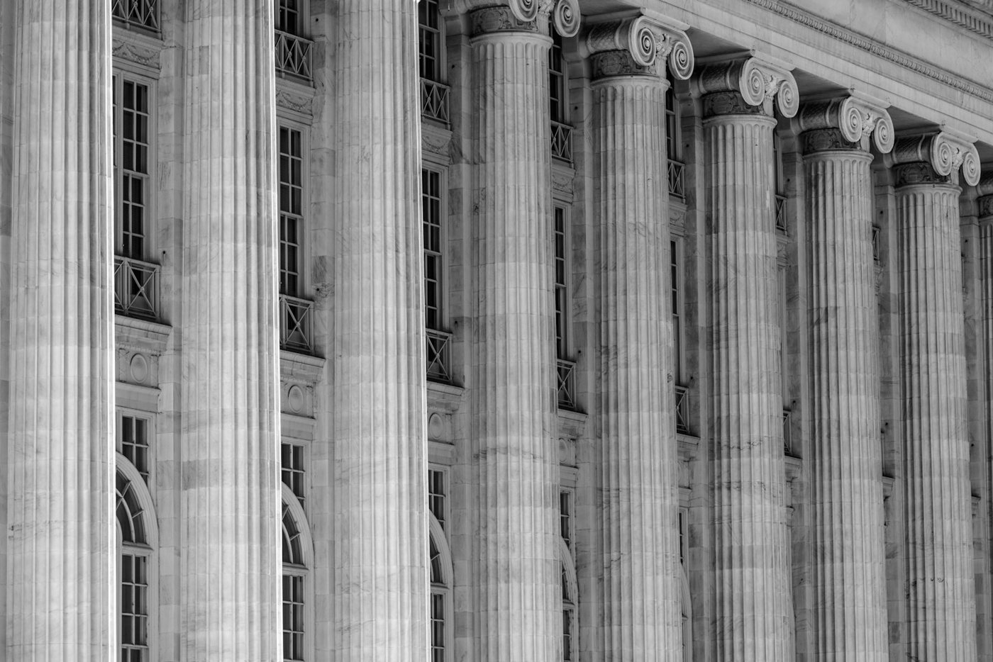 The stone columns of a courthouse facade