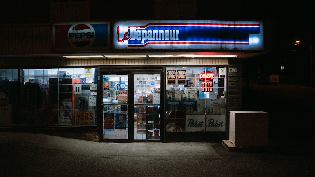 A brightly lit convenience store at night.