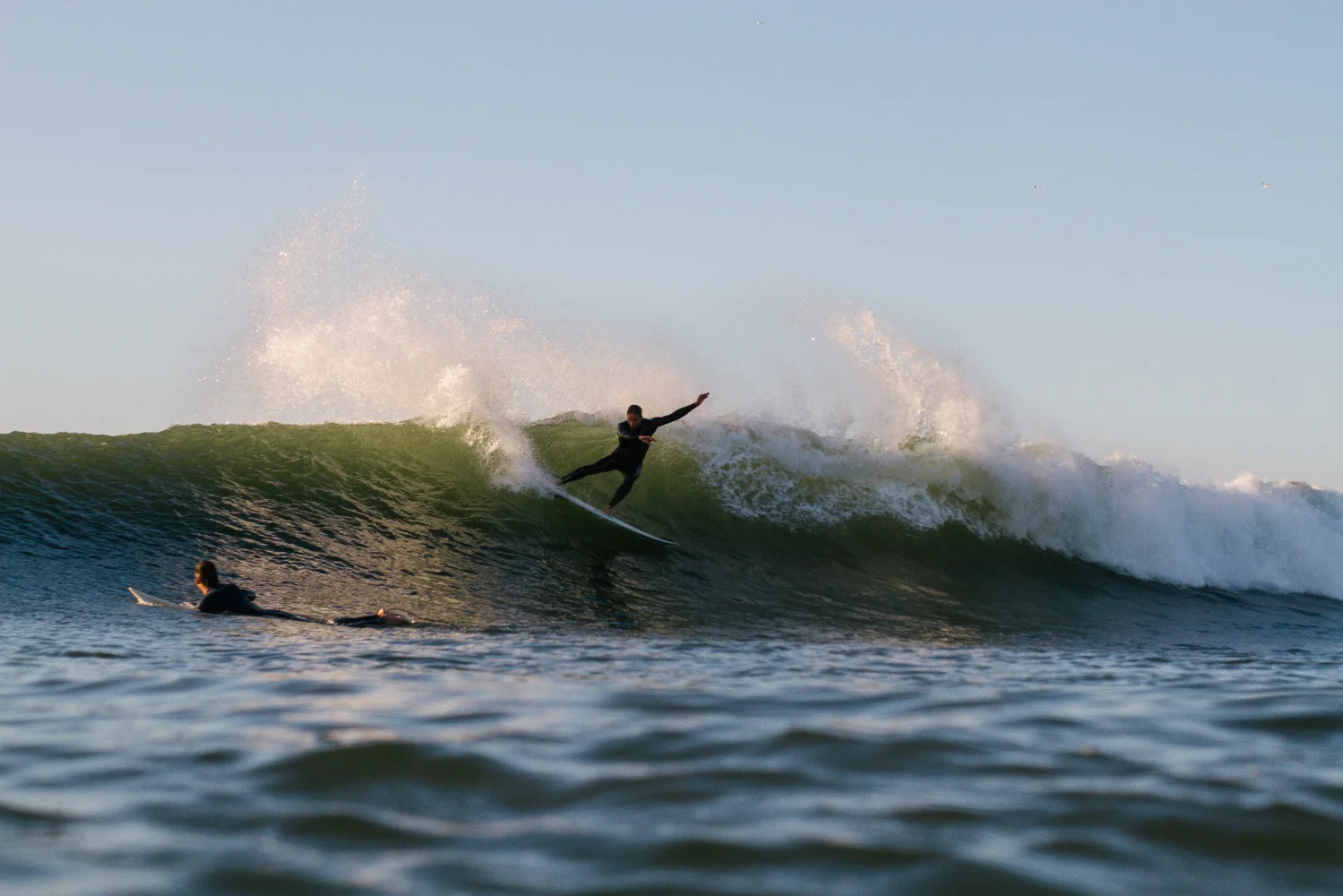 a skilled surfer riding a big wave