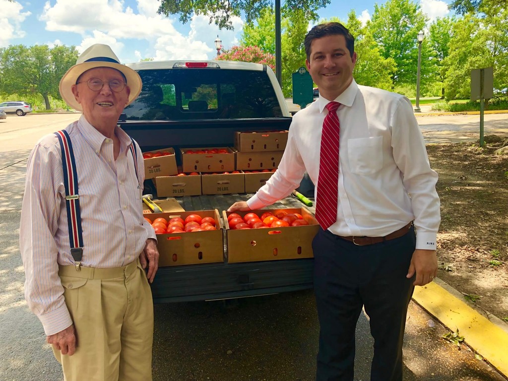 Photo of rick ward and elderly man with tomatoes