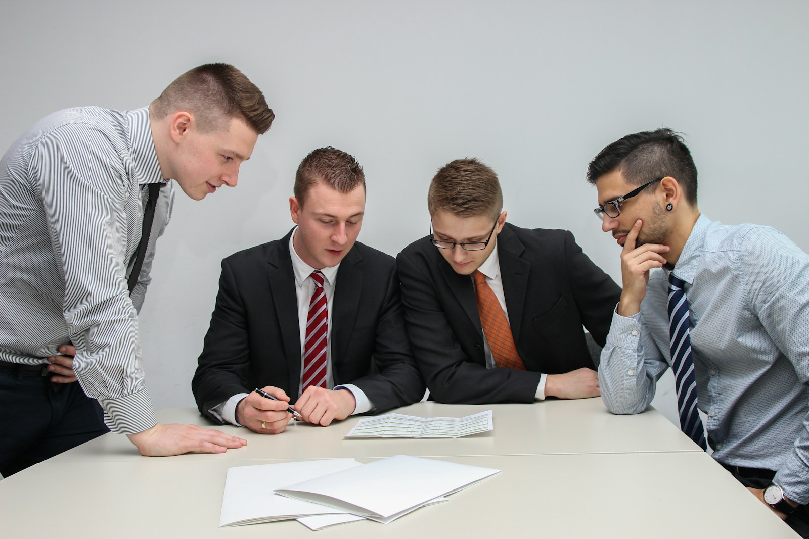 Procurement team reviewing contractor proposals
