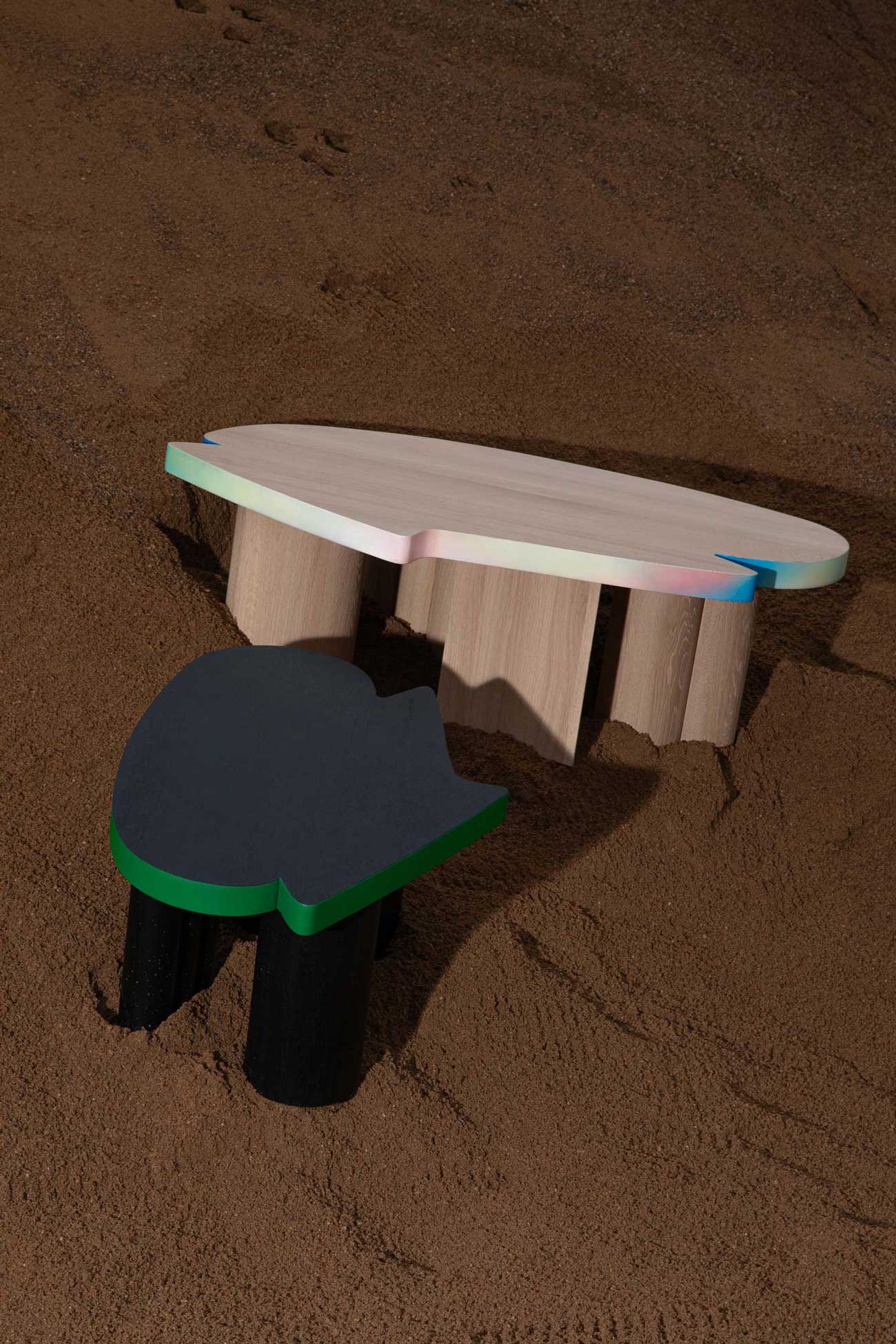 Two variants of Cloudy impromptu noir and pastorale low wood tables by Jiri Krejcirik