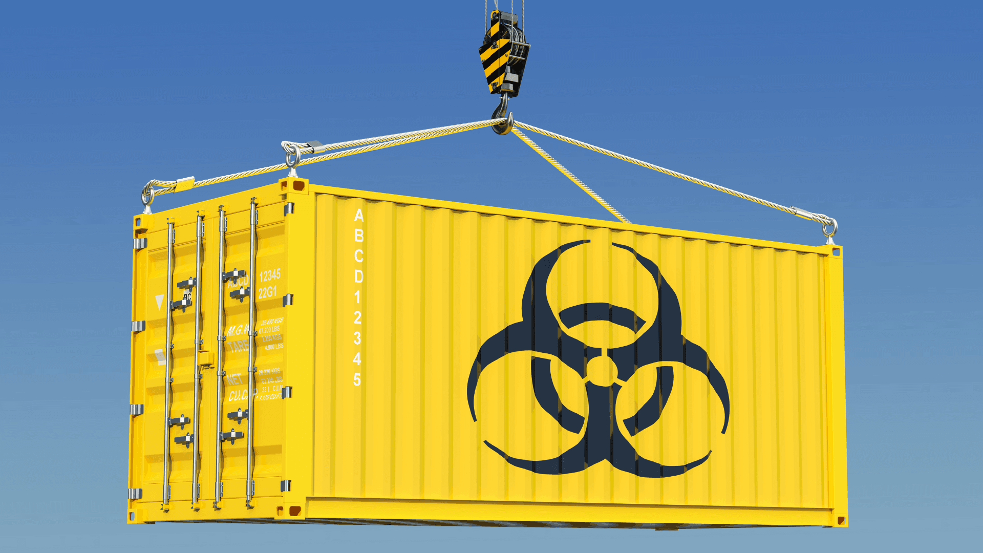 Yellow shipping container with a biohazard symbol being lifted by a crane.
