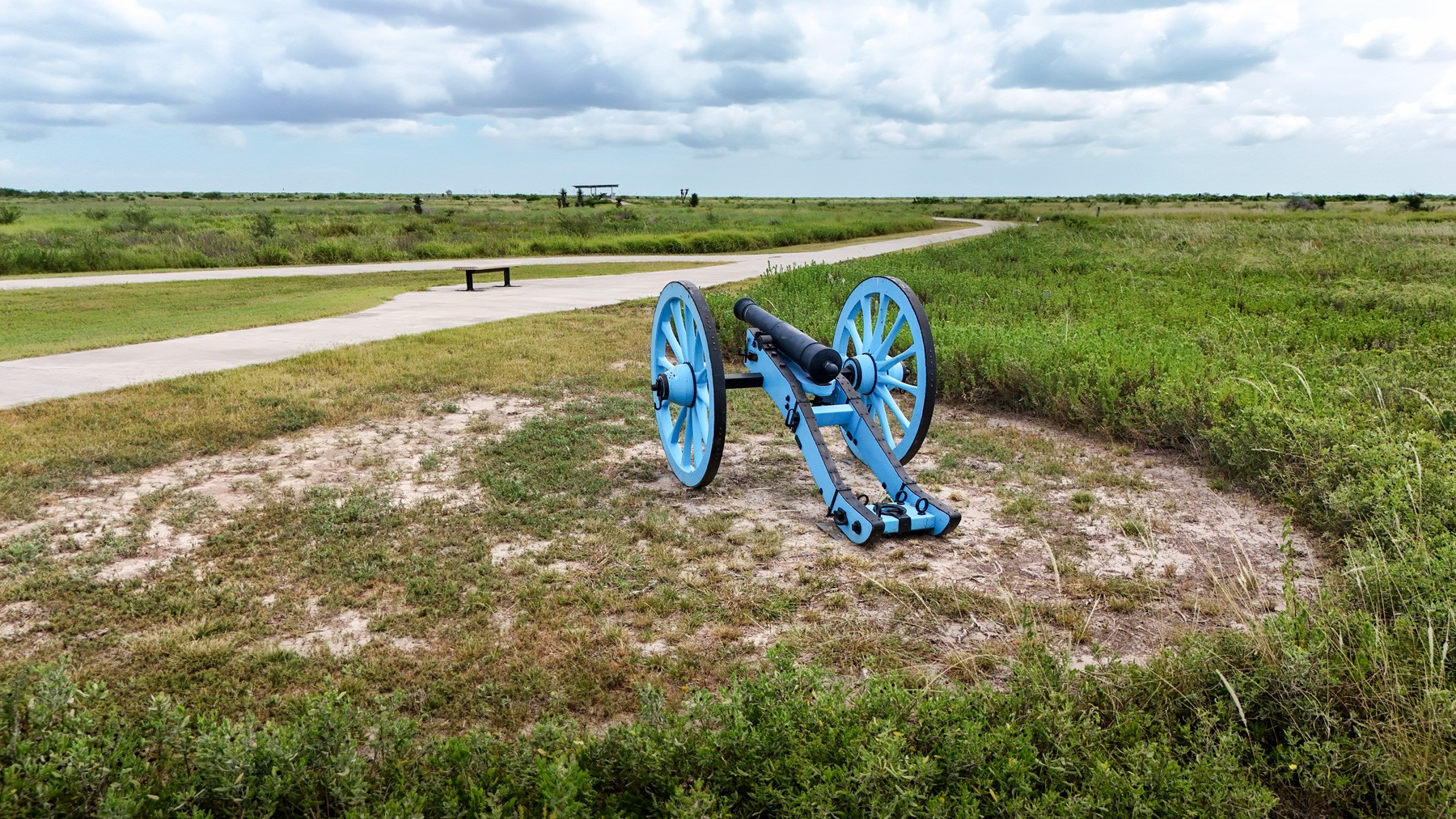 a person sitting in a yellow boat on a river