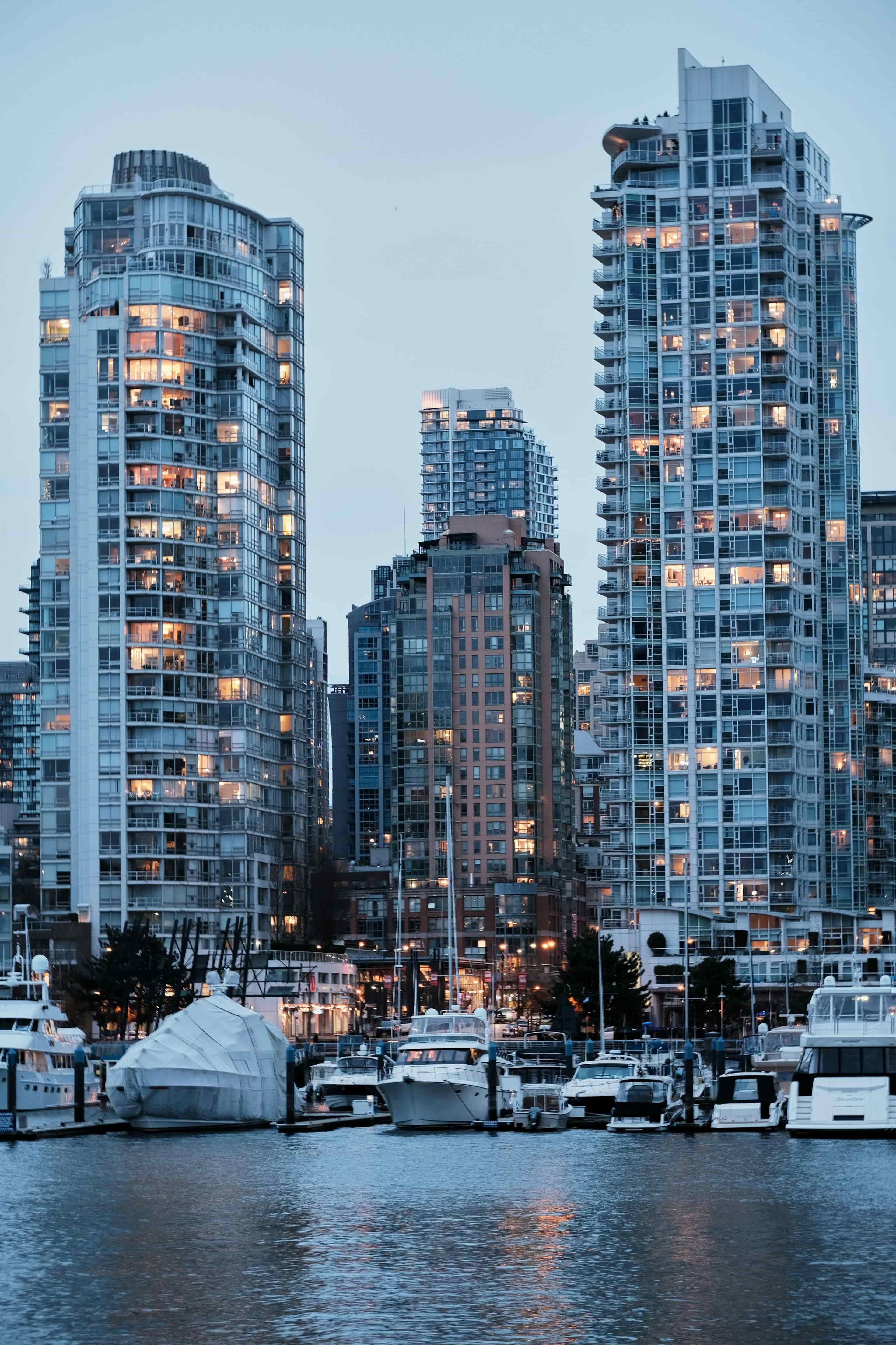 High-rise residential towers in an urban setting at dusk