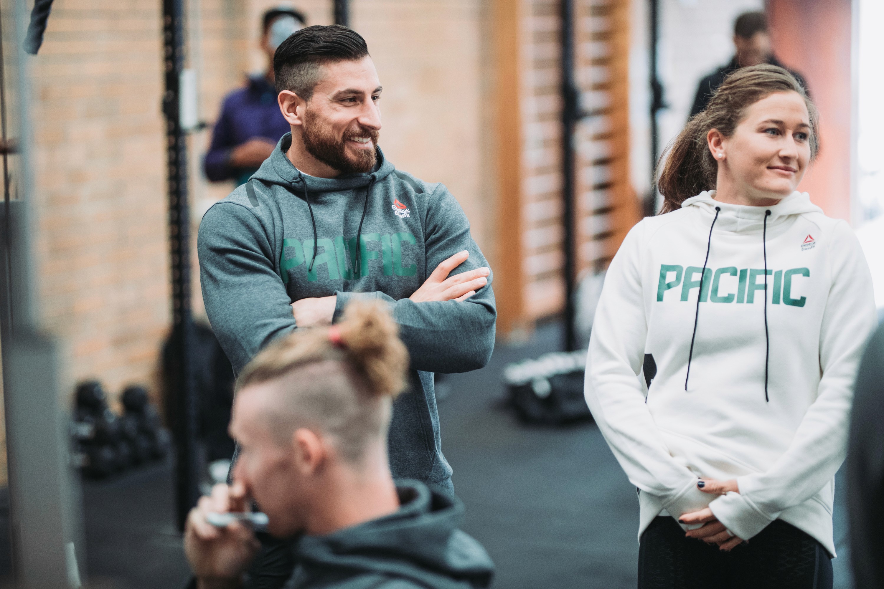 team gathered - Workplace Wellness Program Ideas