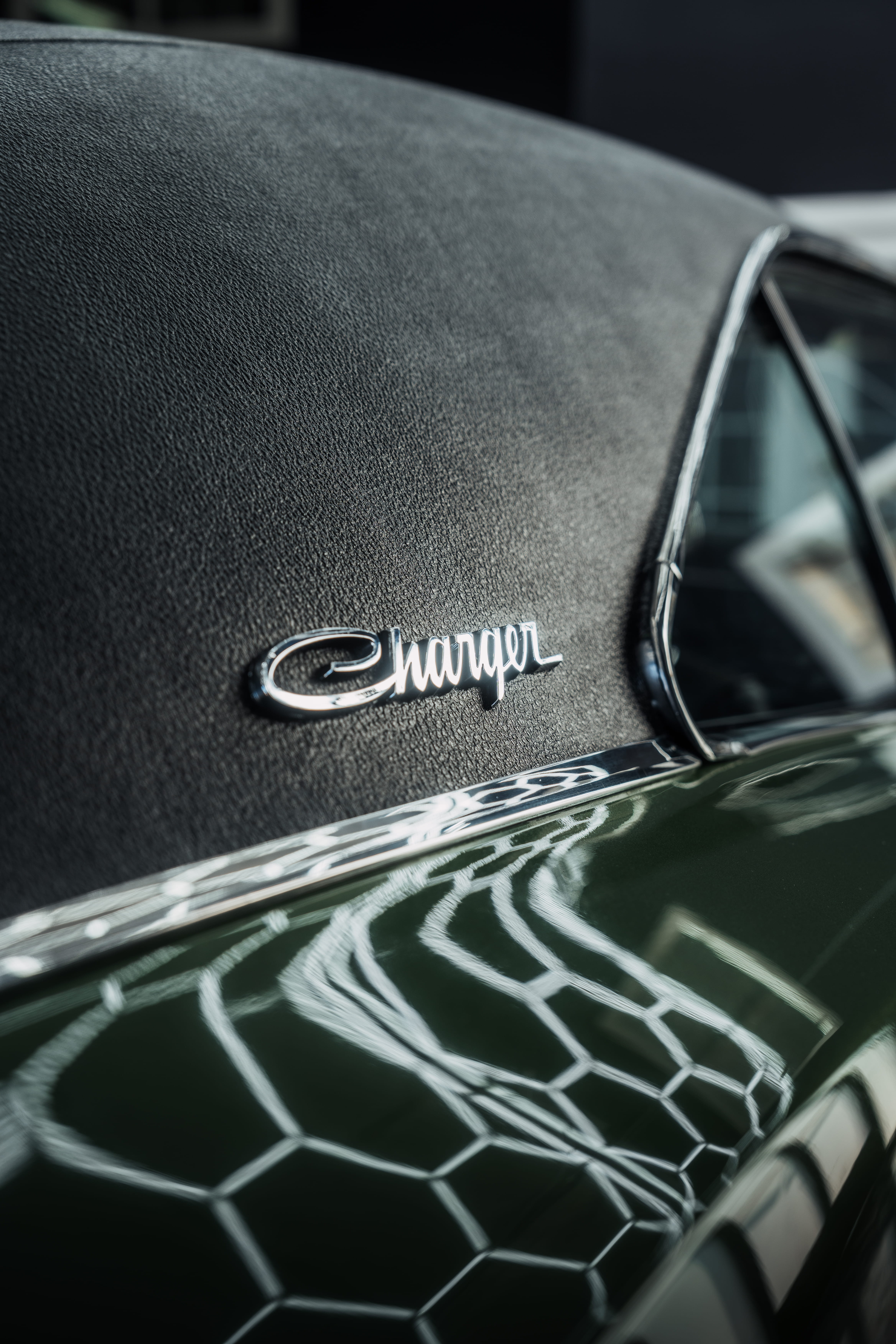 Badge detail on the C-pillar of a green 1969 Dodge Charger with Icon Rocklear permanent paint protection, Dragon Auto Milpitas