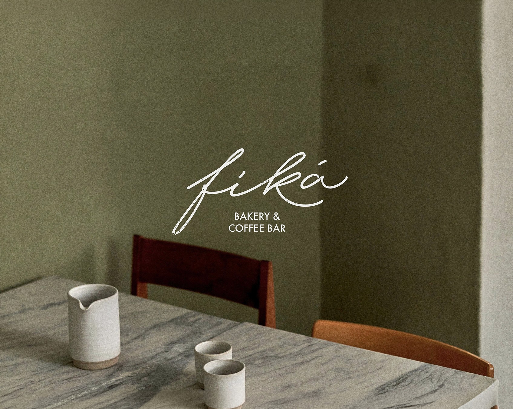 Fiká Bakery & Coffee Bar brand identity shown across logo, menu, stationery, signage, and social media mockups in an earthy green palette.