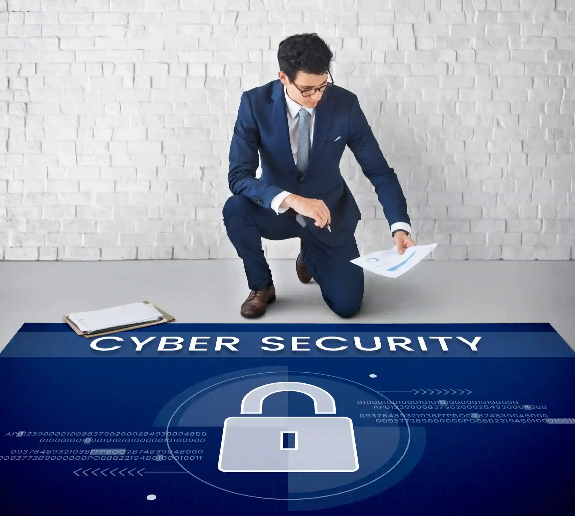 A businessman kneeling behind a cyber security digital banner, representing data protection and online safety for digital blog content.
