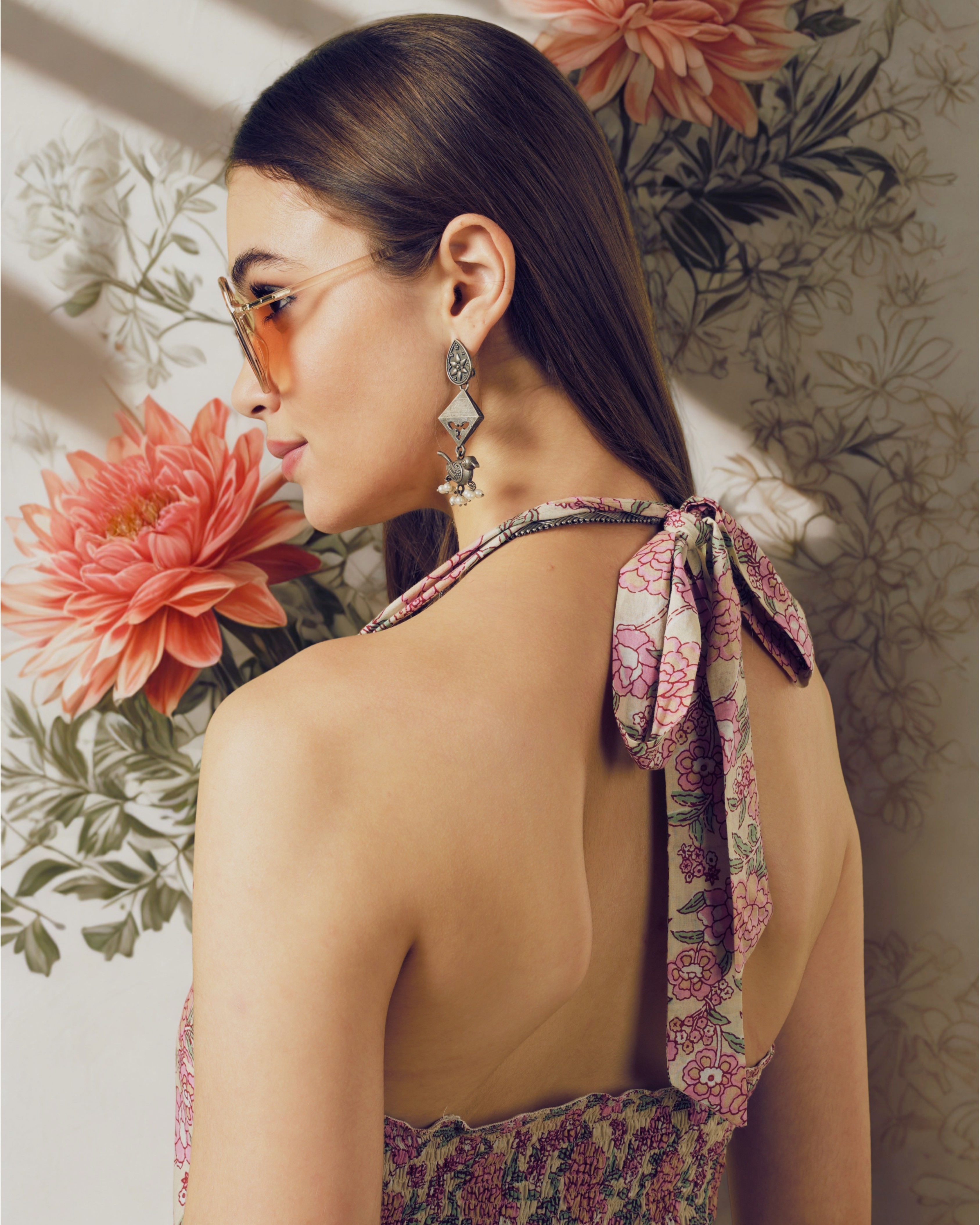 Friends laughing and posing inside a car